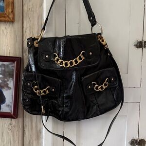 Elegant Black Leather Handbag with Gold Accents Cynthia Rowley